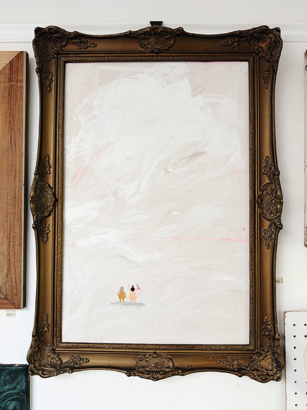 A framed original painting of two illustrated figures, Strawberrie and Maud, up to their knees in water, with a vintage-style frame.