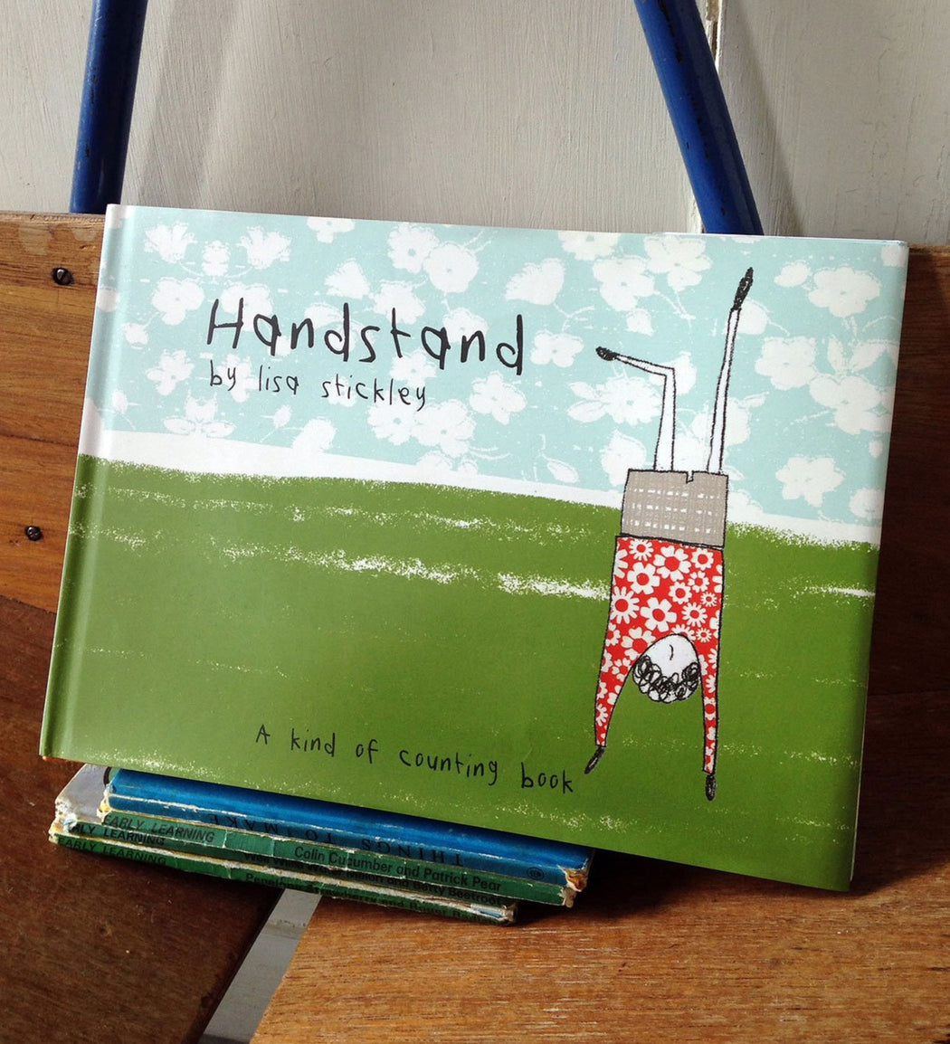 handstand, signed copy + original A4 black & white character drawing.