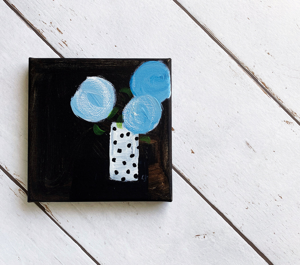 Three Blue Blooms In Mum's Spotty Vase