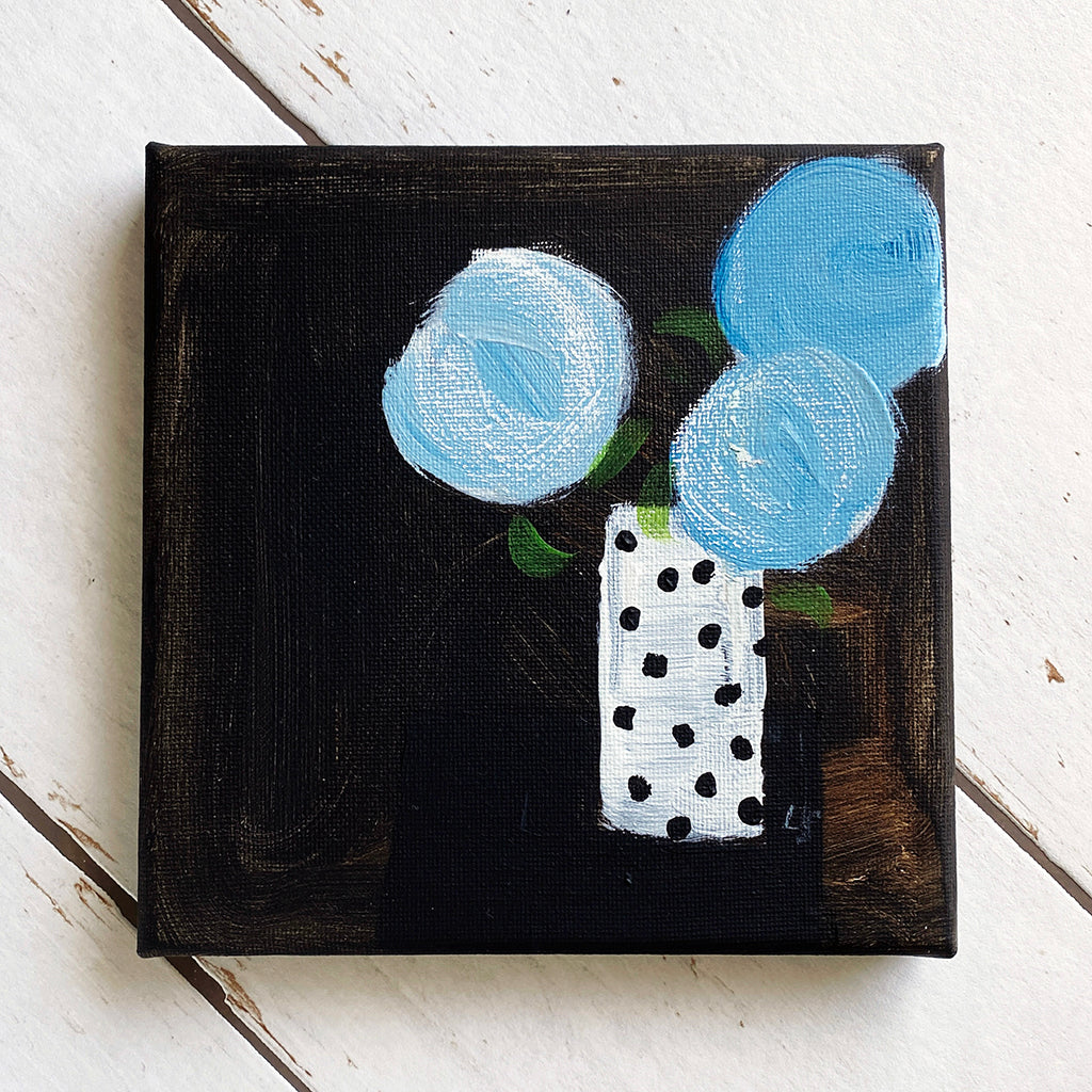 Three Blue Blooms In Mum's Spotty Vase
