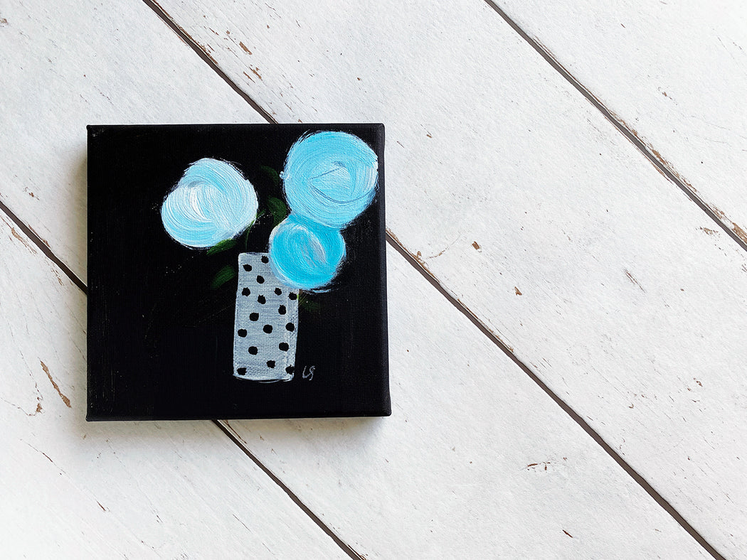 Turquoise Blooms With Black And White Spots