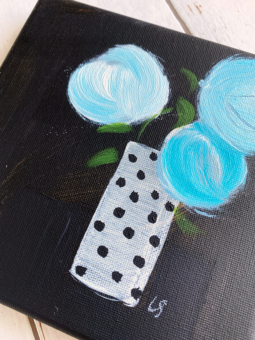 Turquoise Blooms With Black And White Spots