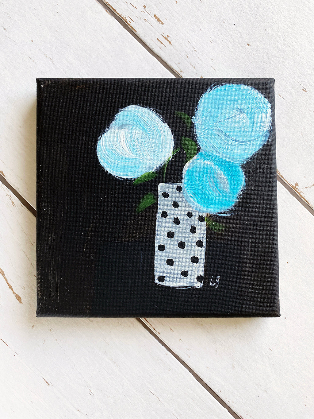 Turquoise Blooms With Black And White Spots